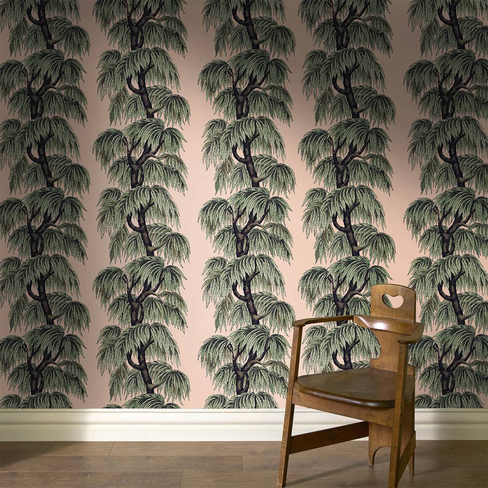 The Hanging Garden wallpaper in blush willow, hung on a wall
